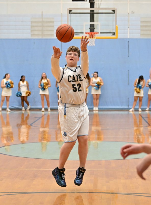 Cape junior Robert Harman-Strike hits a jumper.