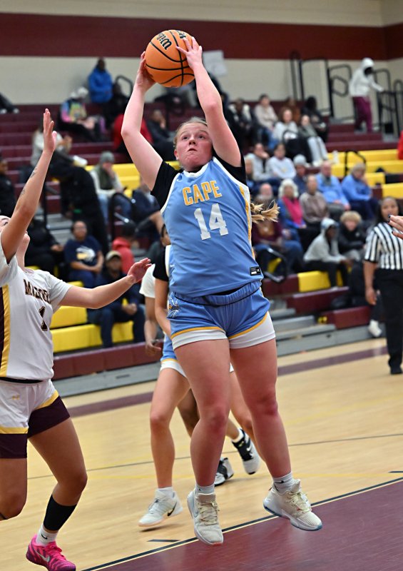 Cape senior Sydney Whetzel snags a strong rebound.