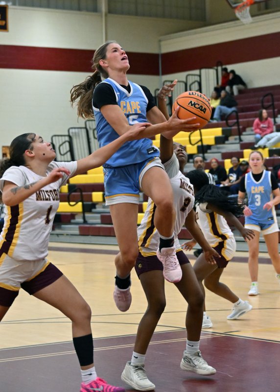 Cape senior Amalia Fruchtman goes airborne in the paint.
