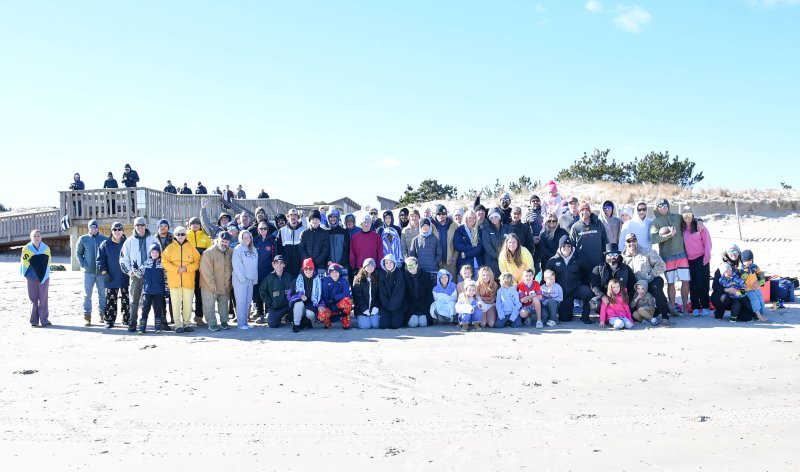 Nearly 80 people of all ages took part in the Lewes Polar Bear Plunge on New Year’s Day at Cape Henlopen State Park.