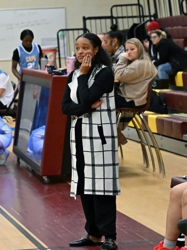 Former Cape standout and Milford head coach Shantel Hazzard ponders her next move in the first half.