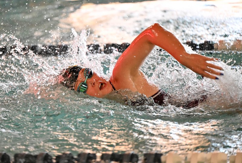 Milford senior captain Madi Stahl swims the freestyle.