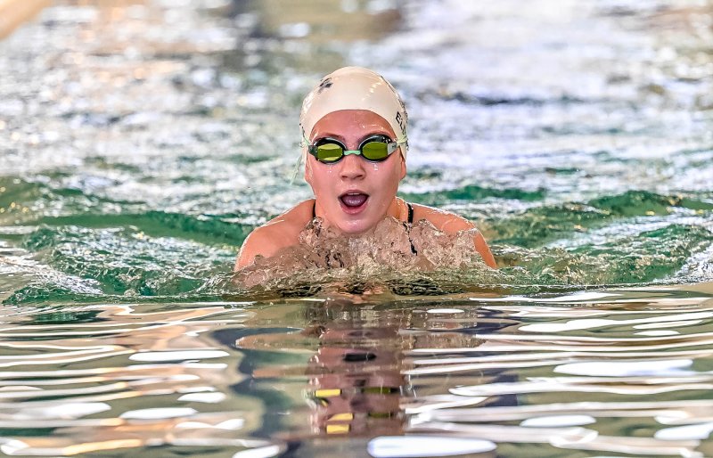 Sussex Academy eighth-grader Catherine Elder swims the individual medley.