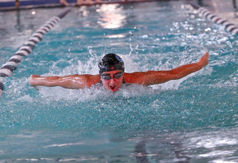 Cape junior Mia Jaoude wins the 100 butterfly with a time of 1:01.10. DAN COOK PHOTOS