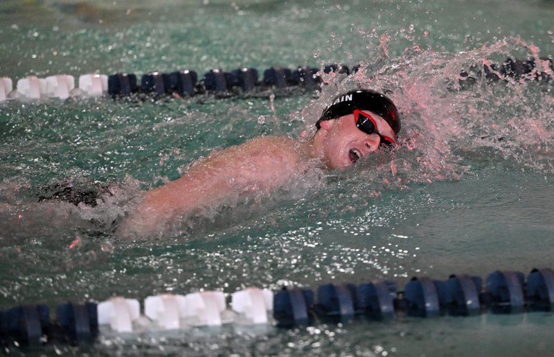 Cape sophomore John Bain wins the 200 free with a 1:56.06.