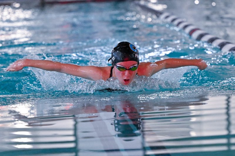Cape sophomore Addison Freebery swims the 100 fly for the Vikings.