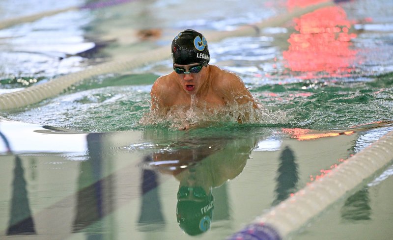 Cape senior Brooks Leonhartt wins the 100 breast with a time of 1:10.80.