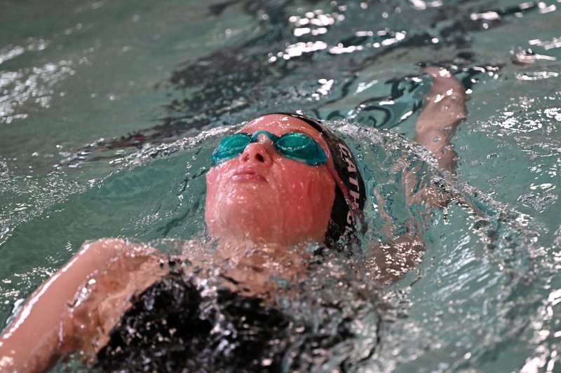 Senior Rylie Cathcart swims the 200 IM for the Vikings.