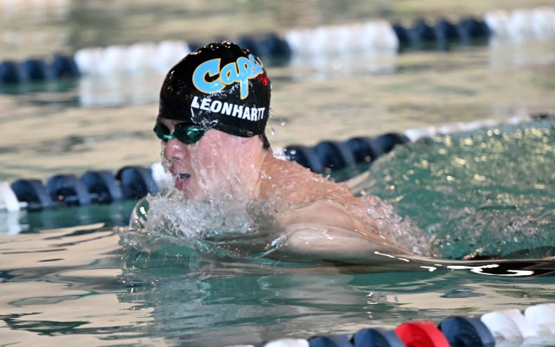 Senior Brooks Leonhartt swims the breast leg of the medley relay.