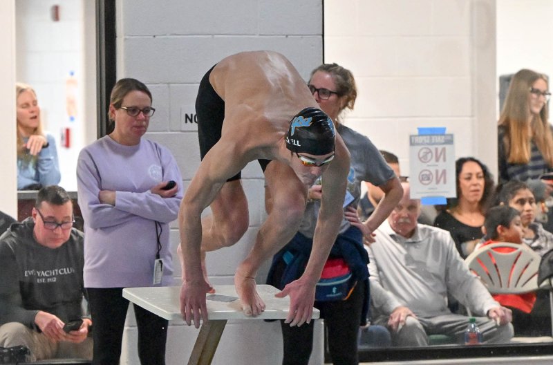 Junior Brady Schell leaves the blocks in the 50 freestyle.