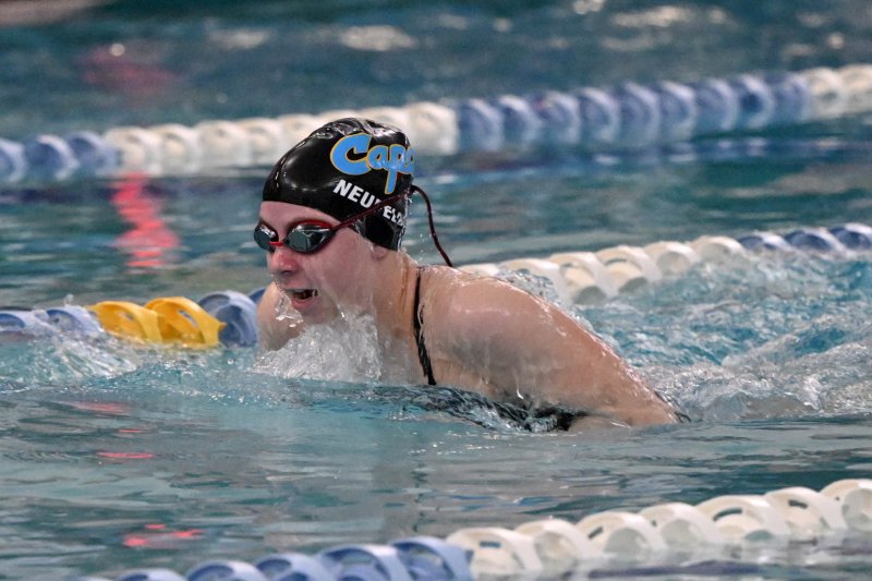 Cape sophomore Zoey Neufeld swims the breaststroke leg for the winning medley relay team. DAN COOK PHOTOS
