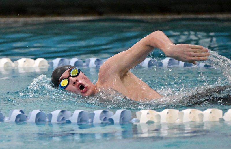 Cape junior Weston Bohl wins the 100 free with a 58.71 time.