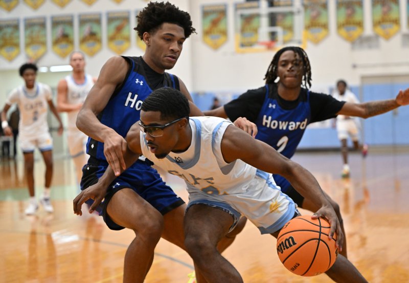 Oz Batson drives the baseline.
