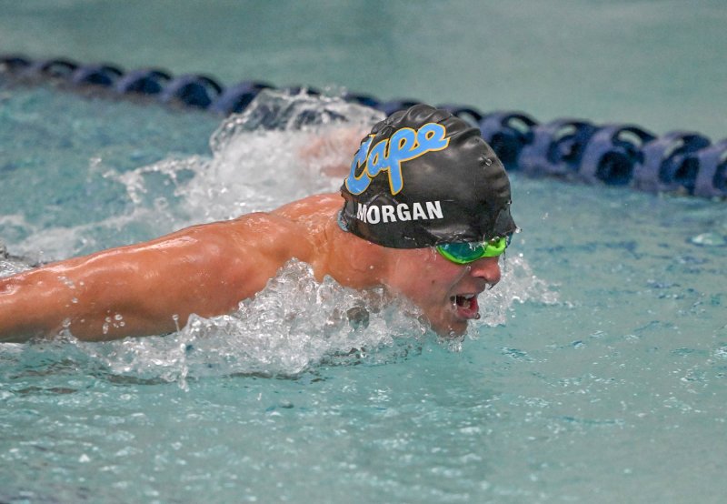 Cape senior Ryan Morgen swims the 100 butterfly.