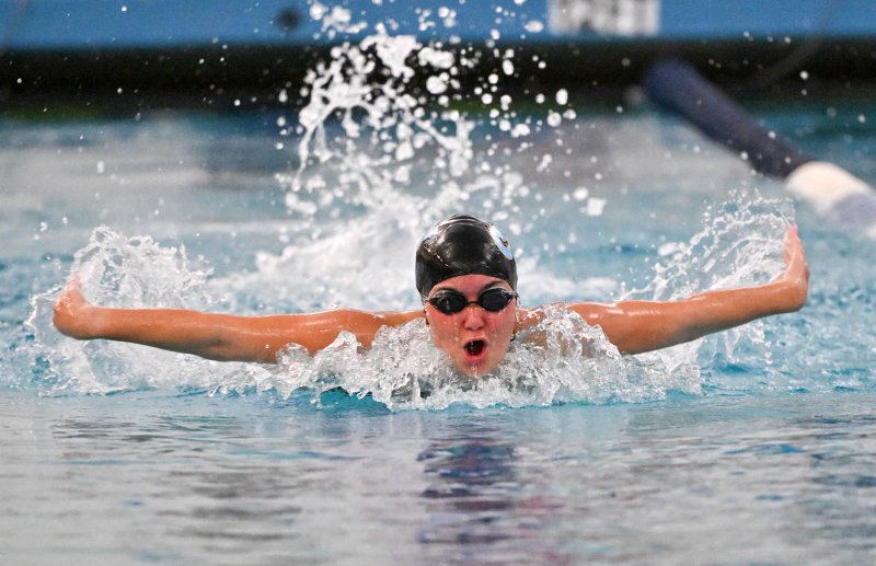 Cape senior Sidney Caldwell wins the 100 fly in 1:13.77.