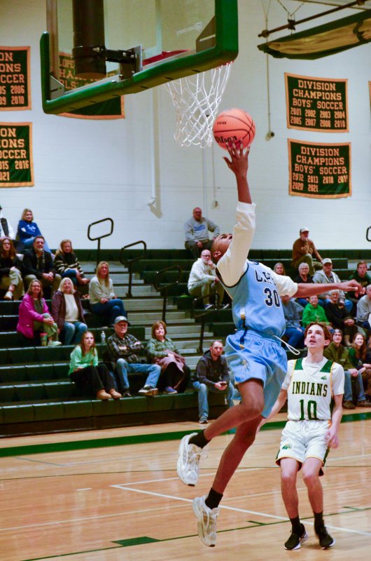 Cape senior Zane Richardson tries for a reverse lay-up after collecting a swipe on defense.