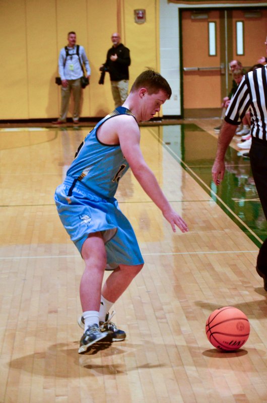 Cape sophomore Luke Archer hustles down the court to keep the ball alive after disrupting a pass on the other end.