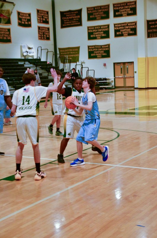 Vikings sophomore Xavier Zimmer tries to fight through a double-team.