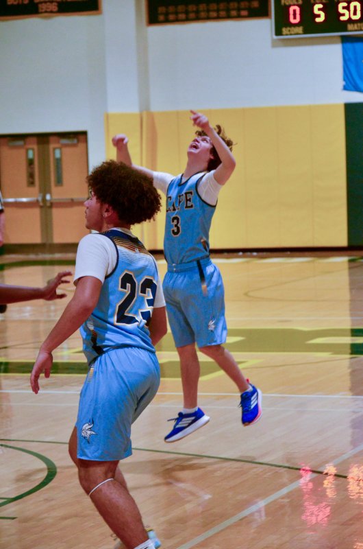 Vikings sophomore Xavier Zimmer celebrates his bucket.