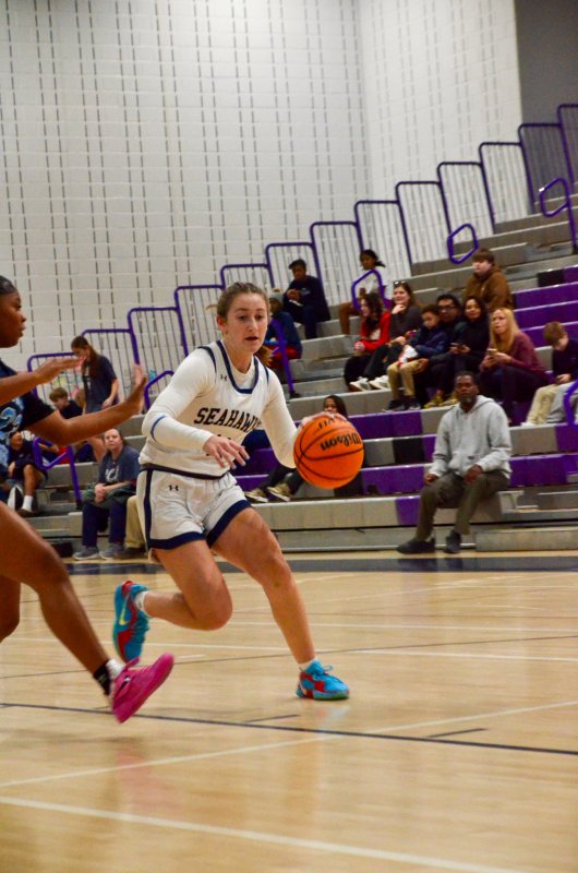 Sussex Academy sophomore Reilly Mobilia dashes into the paint.