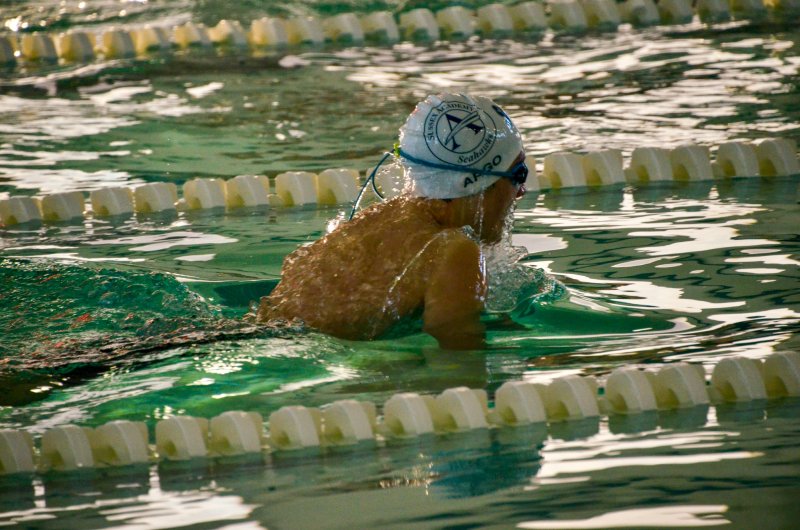 Seahawks eighth-grader Cale Argo completes the breaststroke part of the medley race.