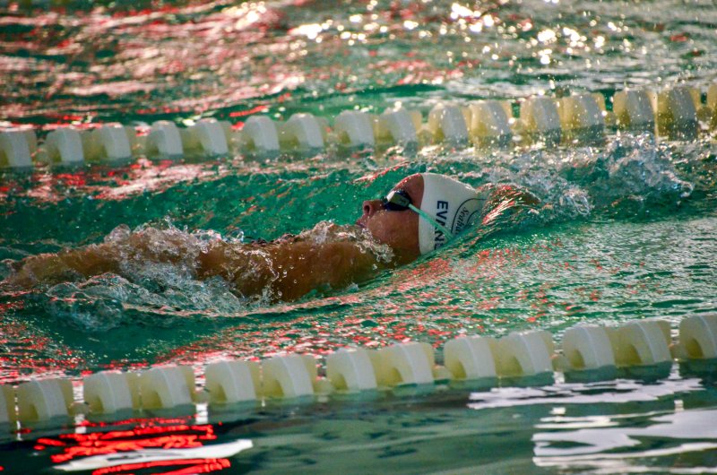 Sussex Academy senior Victoria Evans swims the backstroke leg of the 200 individual medley, finishing with a winning time of 2:25.85.