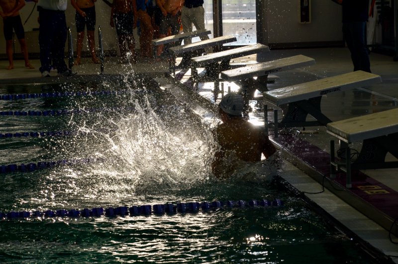 Sussex Academy senior Christian Wright smacks the water after setting a new school record of 22.18 in the 50 freestyle.