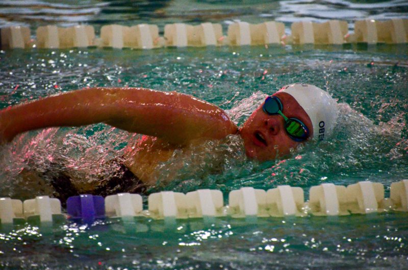 Sussex Academy senior Emily Obertubbesing helps her relay team to victory in the 200 freestyle.