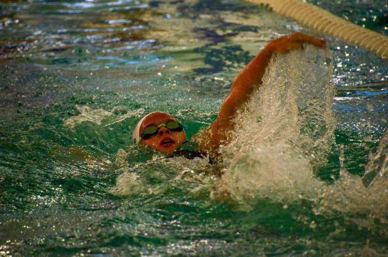 Sussex Academy senior Victoria Evans backstrokes her way to victory.