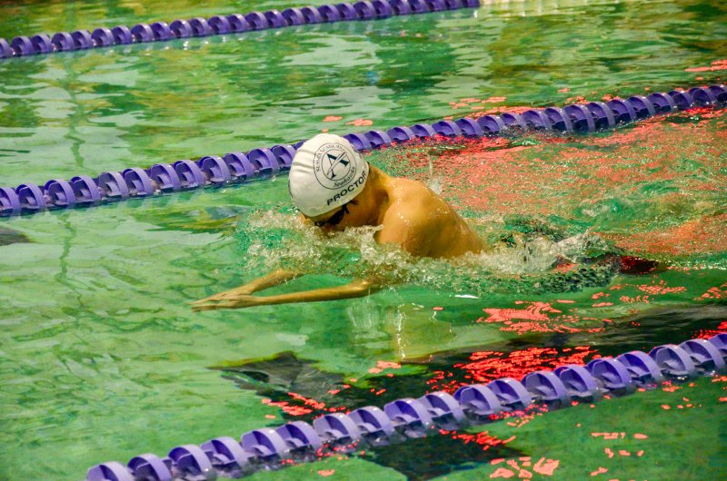Seahawks sophomore Jackson Proctor ducks under during the breaststroke.