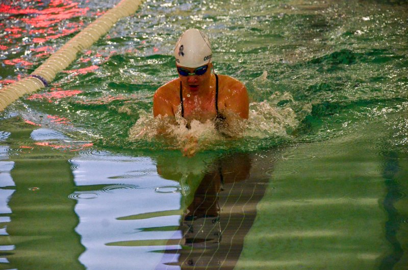 Sussex Academy senior Emily Obertubbesing gathers some air during the breaststroke.