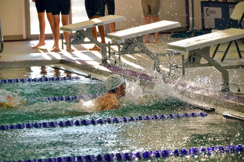 Sussex Academy senior Kieran Probert splashes into first place in the 50 freestyle during the Seahawks’ Jan. 16 victory over Sussex Central. The girls toppled the Golden Knights and the Seaford Blue Jays. AARON R. MUSHRUSH PHOTOS