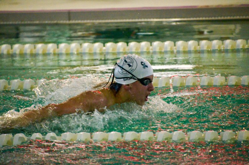 Seahawks freshman Caleb Siok breaches during the butterfly.