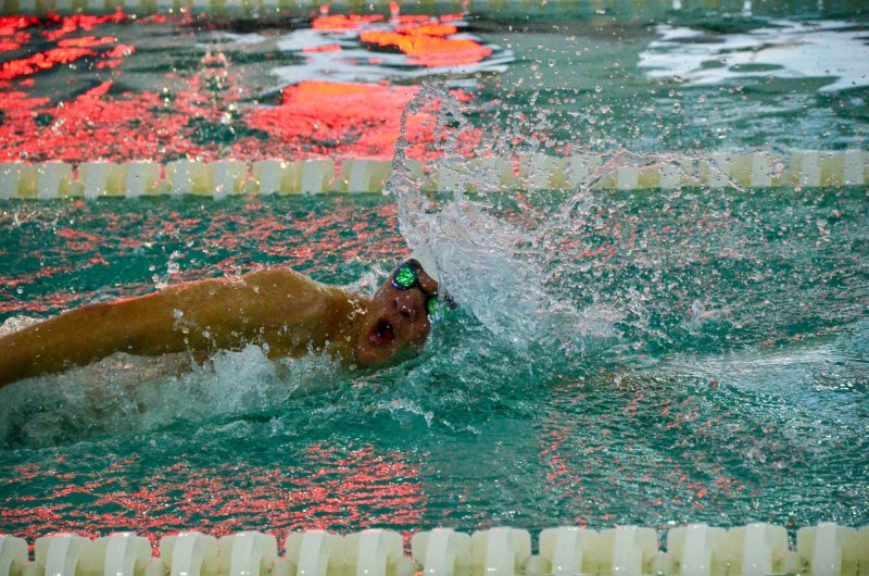 Sussex Academy senior Keiran Probert grabs some air in the 50 freestyle.