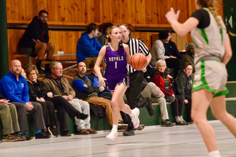 Delmarva Christian senior Riley Barto brings the ball across half-court.