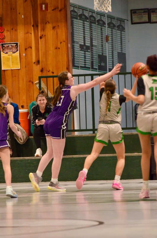 Royals freshman Hannah Silben complicates the shot attempt.