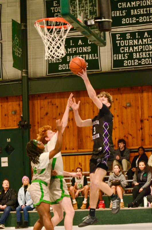 Delmarva Christian junior Noah Barbrow flies up to the rim.