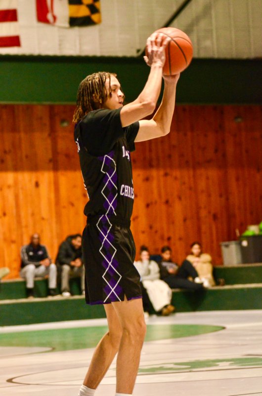 Royals senior Seth Mifflin begins to pass the ball.