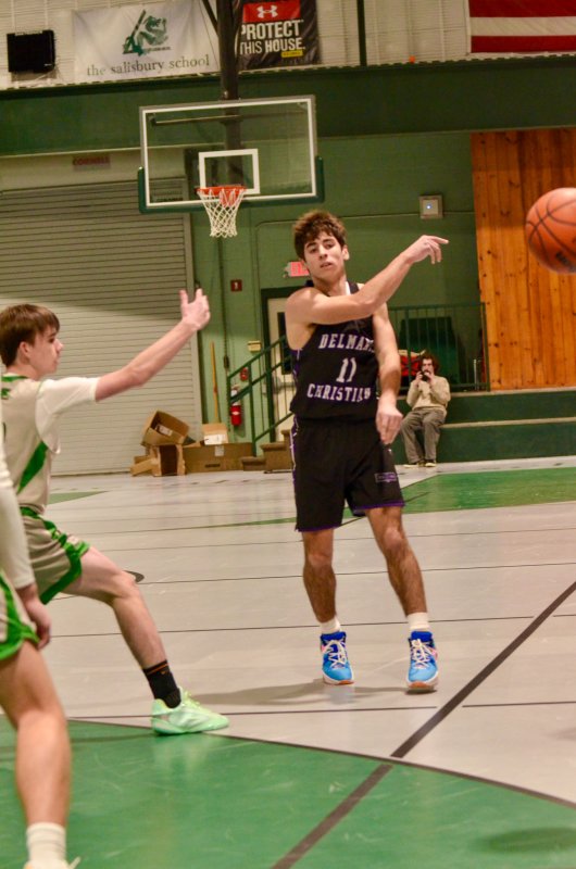 Delmarva Christian junior Isaiah McCluskey sends the ball into the corner.