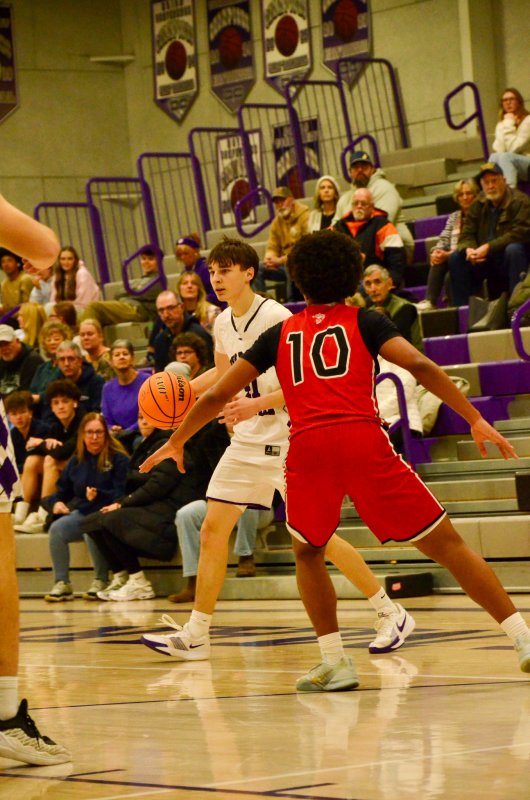 Royals sophomore Asher Woods operates outside the arc.