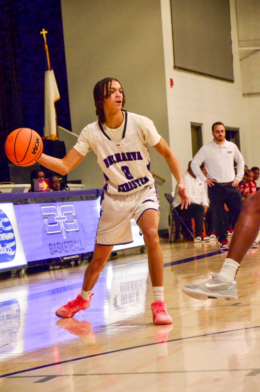 Delmarva Christian senior Seth Mifflin dishes the ball inside.
