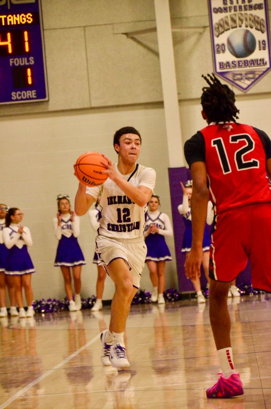 Royals freshman Aarian Tucker crosses mid-court.