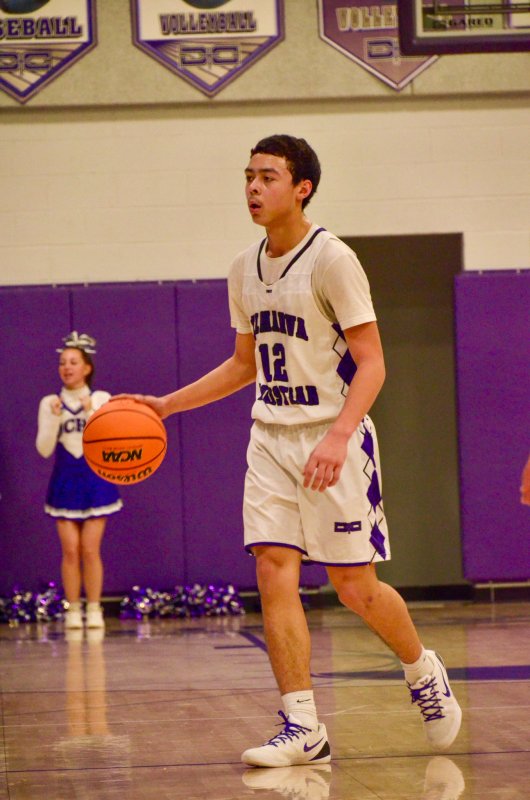 Royals freshman Aarian Tucker looks over to the bench.
