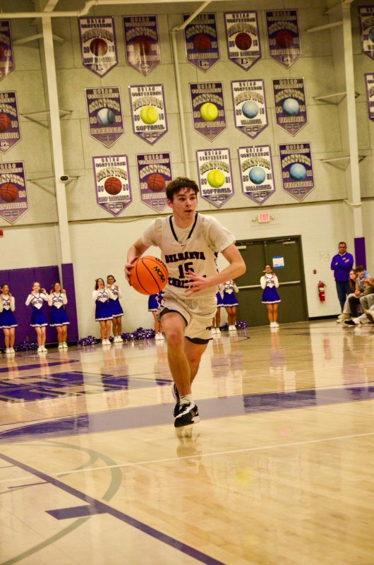 Delmarva Christian senior Gideon Woods drives into the lane.
