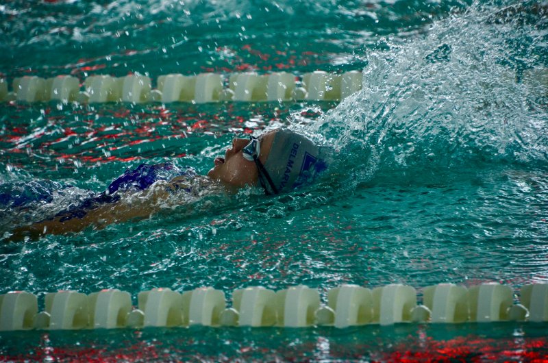 Delmarva Christian sophomore Kaylin Conaway swims the backstroke in the medley race.