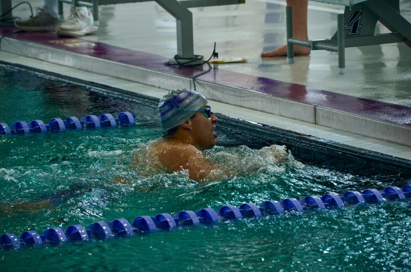 Royals sophomore Tristan McCullough grabs first in the 200 freestyle.