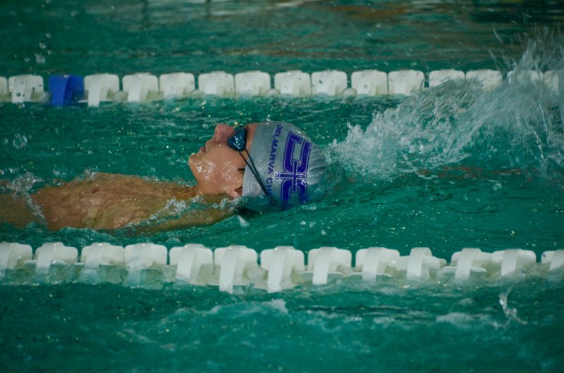 Royals sophomore Jack Louden swims the backstroke in the individual medley.