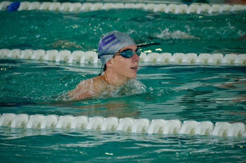 Delmarva Christian sophomore Jack Louden surfaces during the breaststroke leg of the individual medley.