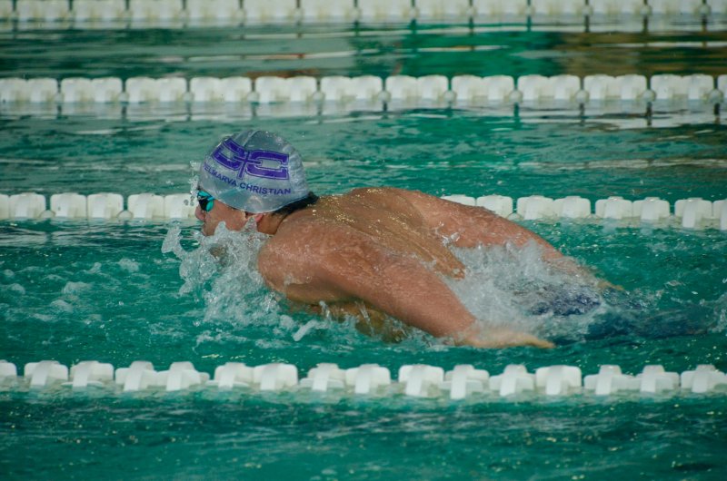 Royals sophomore Tristan McCullough torpedoes through the water in the butterfly.