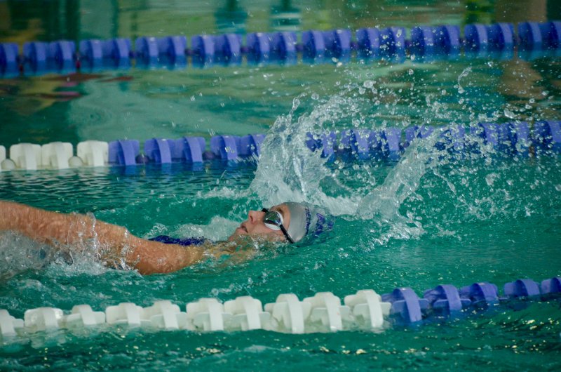 Royals sophomore Kaylin Conaway competes in the backstroke.
